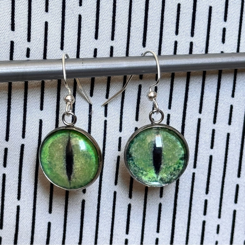 Green Mythical Creature Cat Eye Silver Drop Earrings